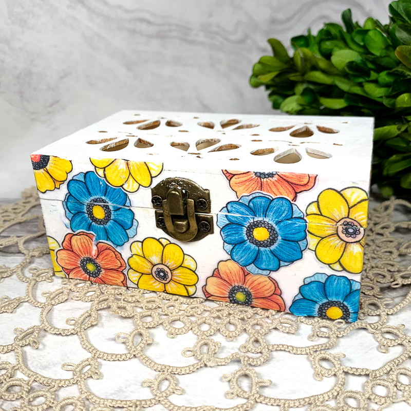 pretty wooden storage box decoupaged with colourful flowers