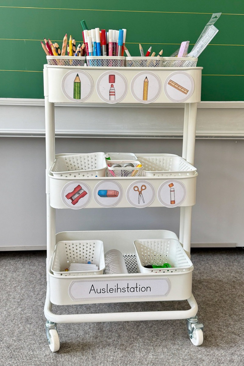 An organised classroom supply station that encourages independence and responsibility. The visual labels help students quickly find and return materials on their own.