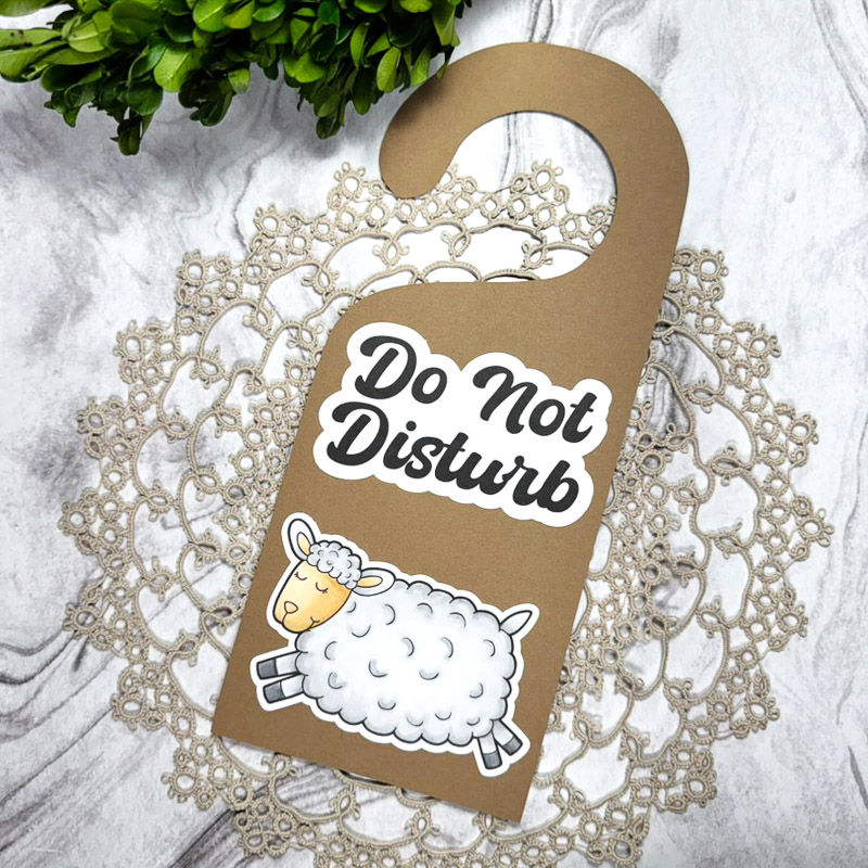 handmade do not disturb door hanger featuring a cute sheep illustration